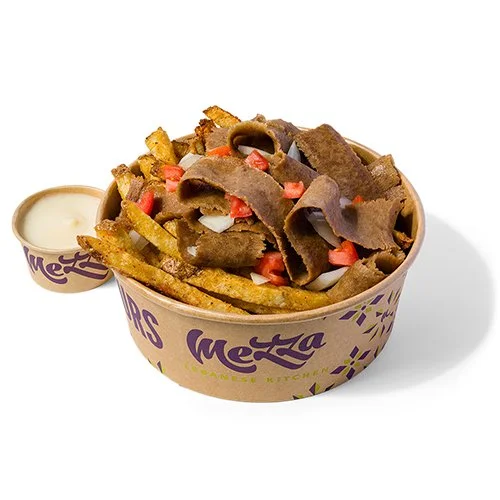 Donair Lunch Plate with Mezza Spiced Fries and donair sauce, with tomatoes and onions in a Mezza takeout container.