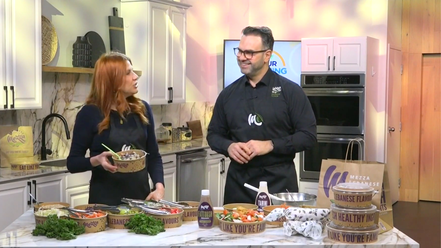 Tony Nahas showing Mezza Lebanese Kitchen's Chimi-Tahini Steak products on CTV Your Morning Atlantic