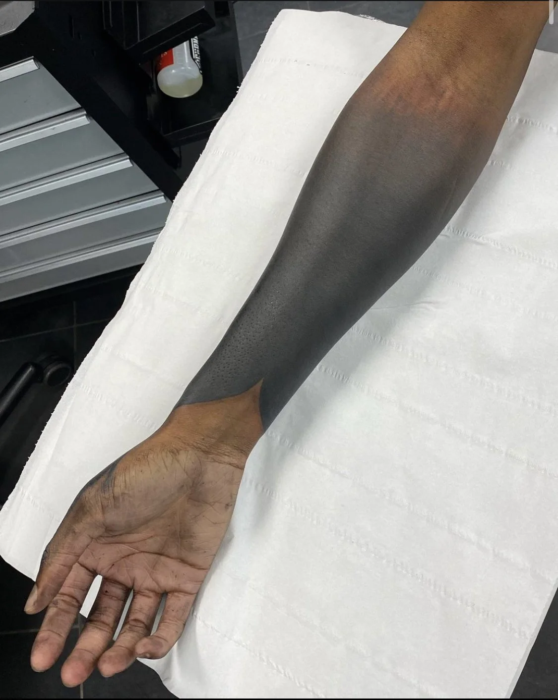 Blackout Fade Out sleeve tattoo by Gormex, London tattoo artist