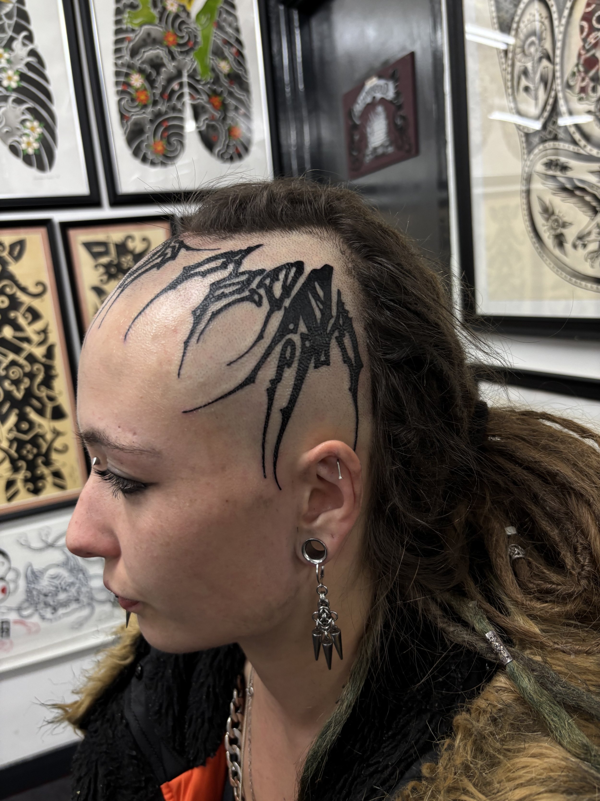 blackwork head tattoo done by Gormex at seven Doors Tattoo
