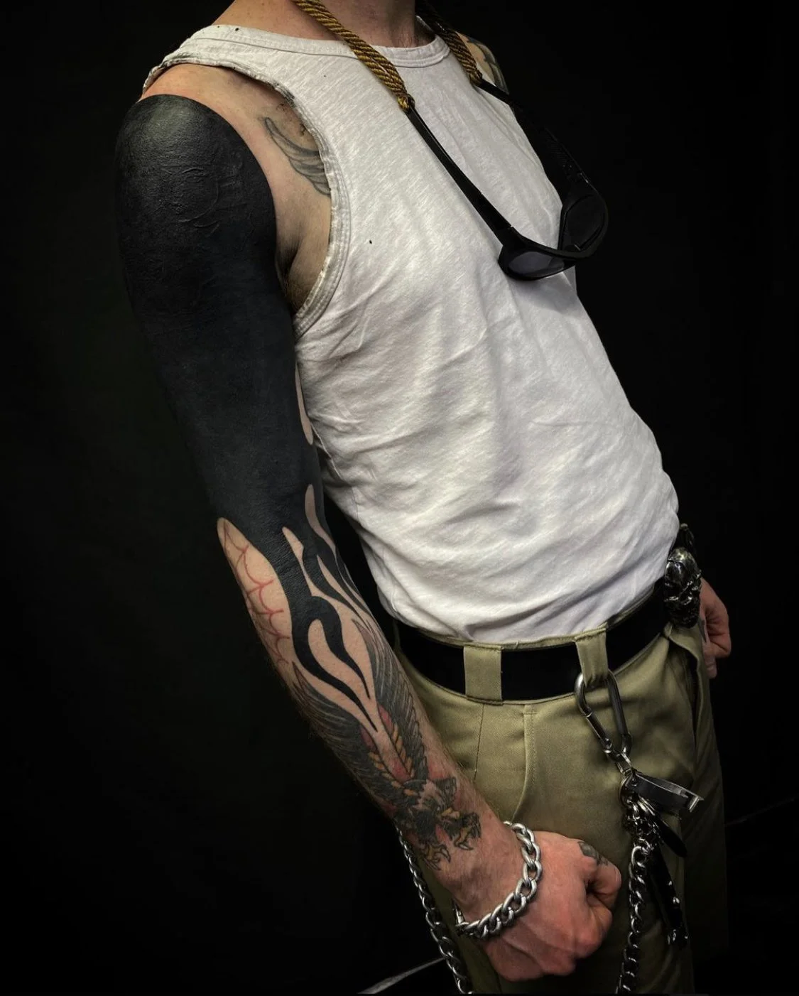 Blackout held sleeve, flames tattoo by Gormex, London tattoo artist