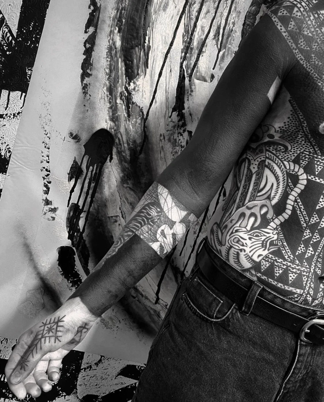 Blackout with negative space  tattoo by Gormex, London tattoo artist
