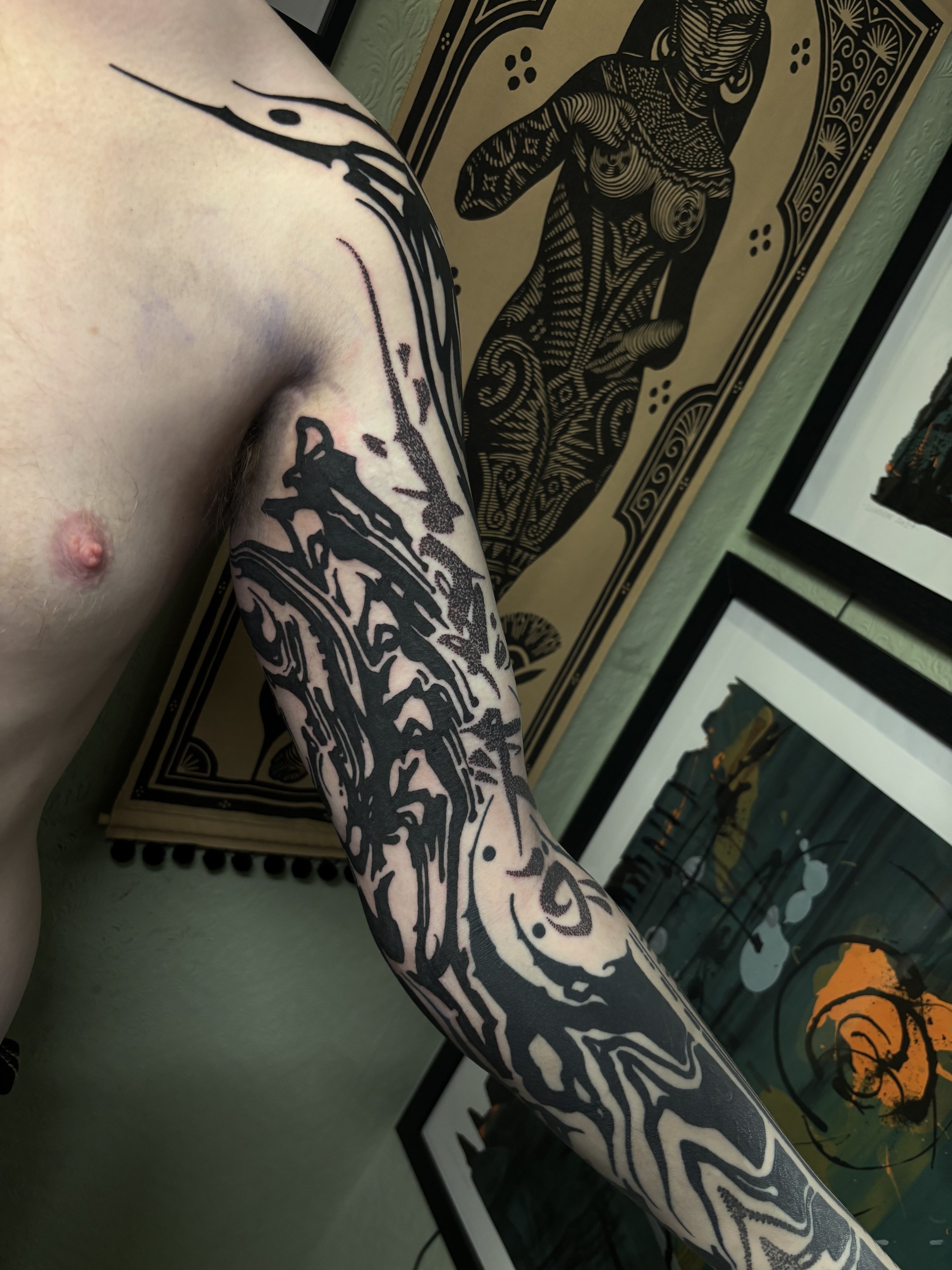 Abstract Blackwork sleeve with distorted patterns and textures. done by Gormex in London 