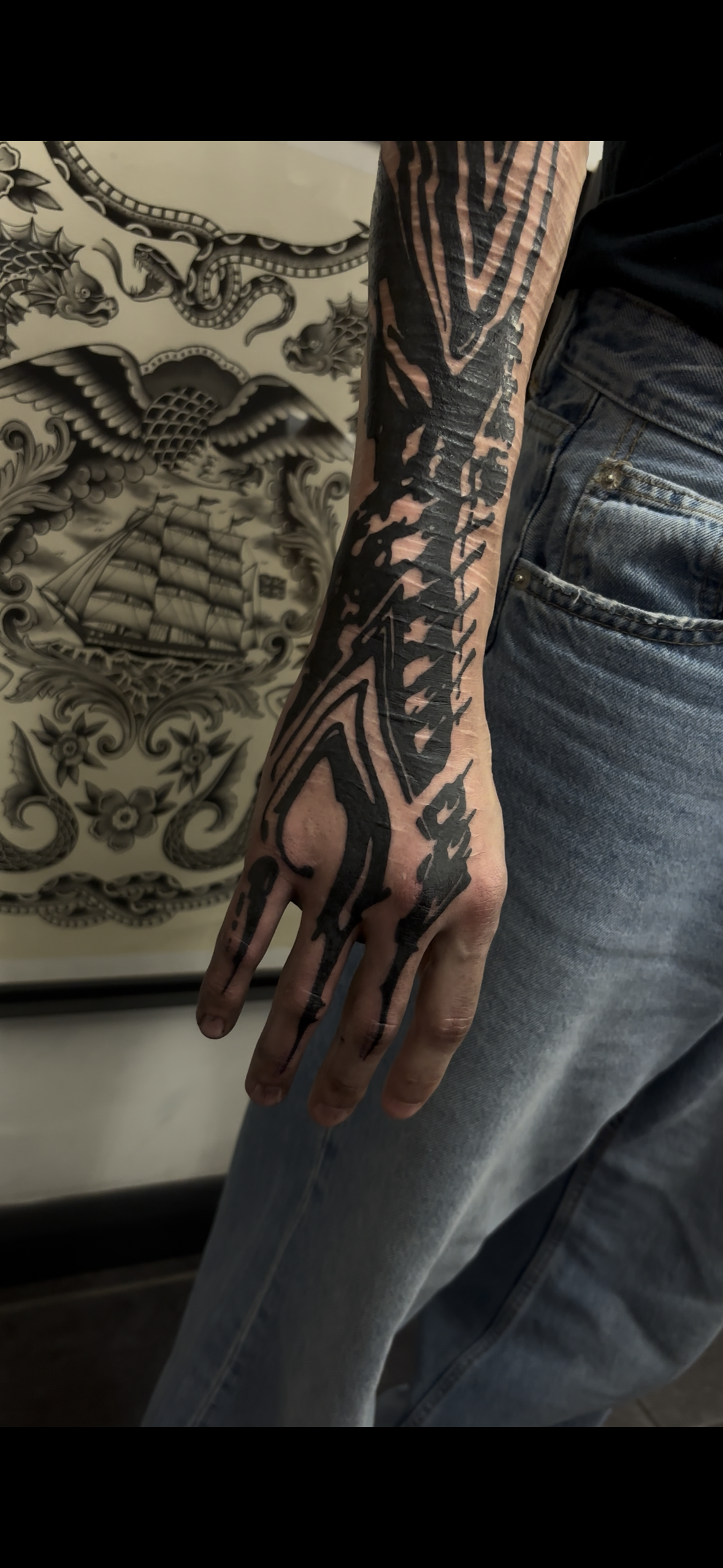 Abstract Blackwork half sleeve and hand, fingers with distorted patterns and textures, and a pinch of abstract Calligraphy. Done by Görmex in London at seven Doors Tattoo