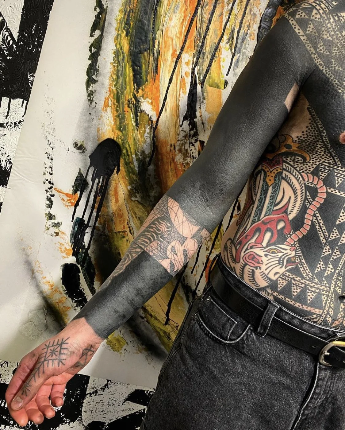 Blackout with negative space  tattoo by Gormex, London tattoo artist