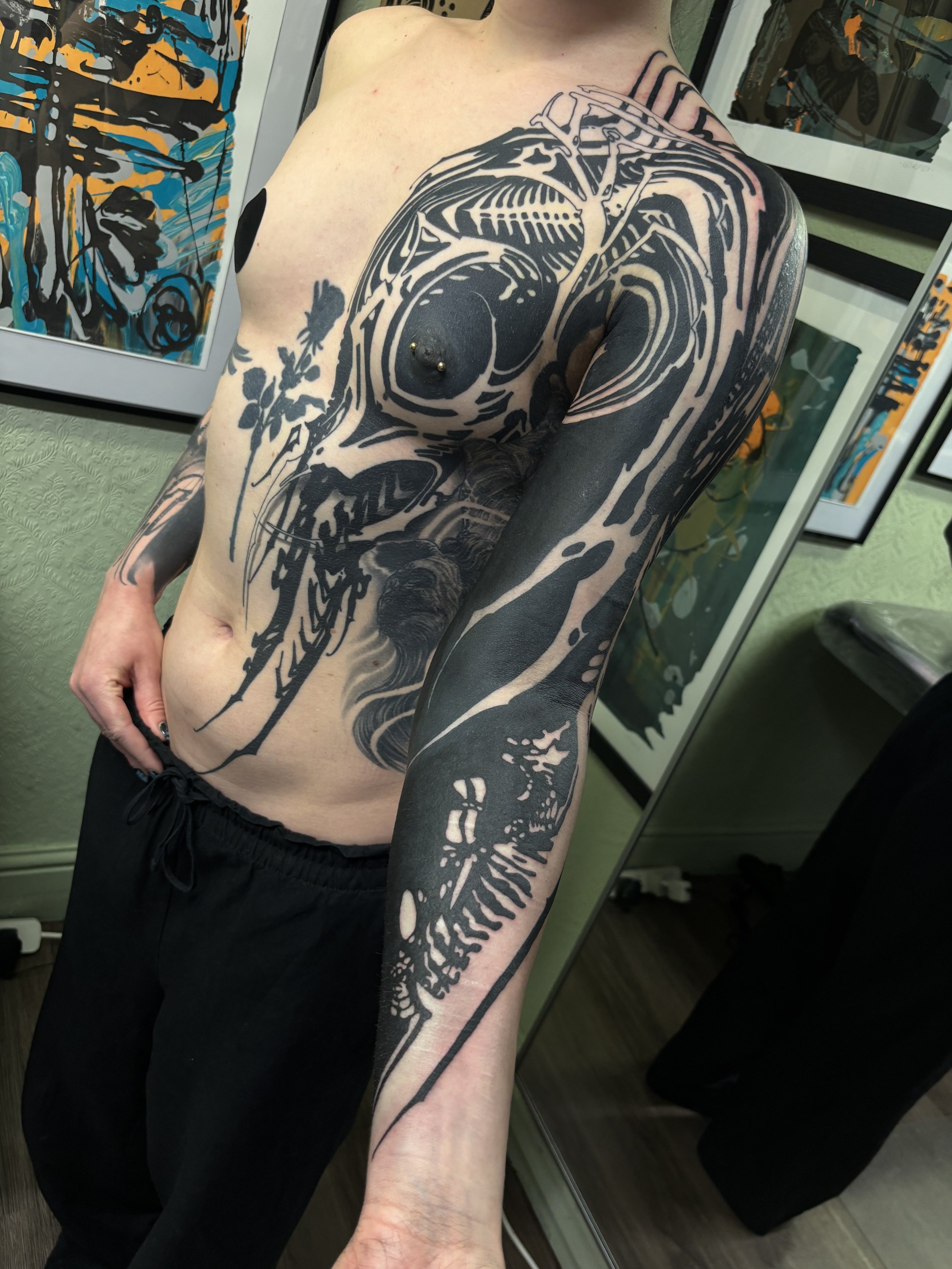 Blackout tattoo sleeve with some negative spaces. Abstract Texture front piece in progress. Done by GÖRMEX in London, at Seven Doors Tattoo