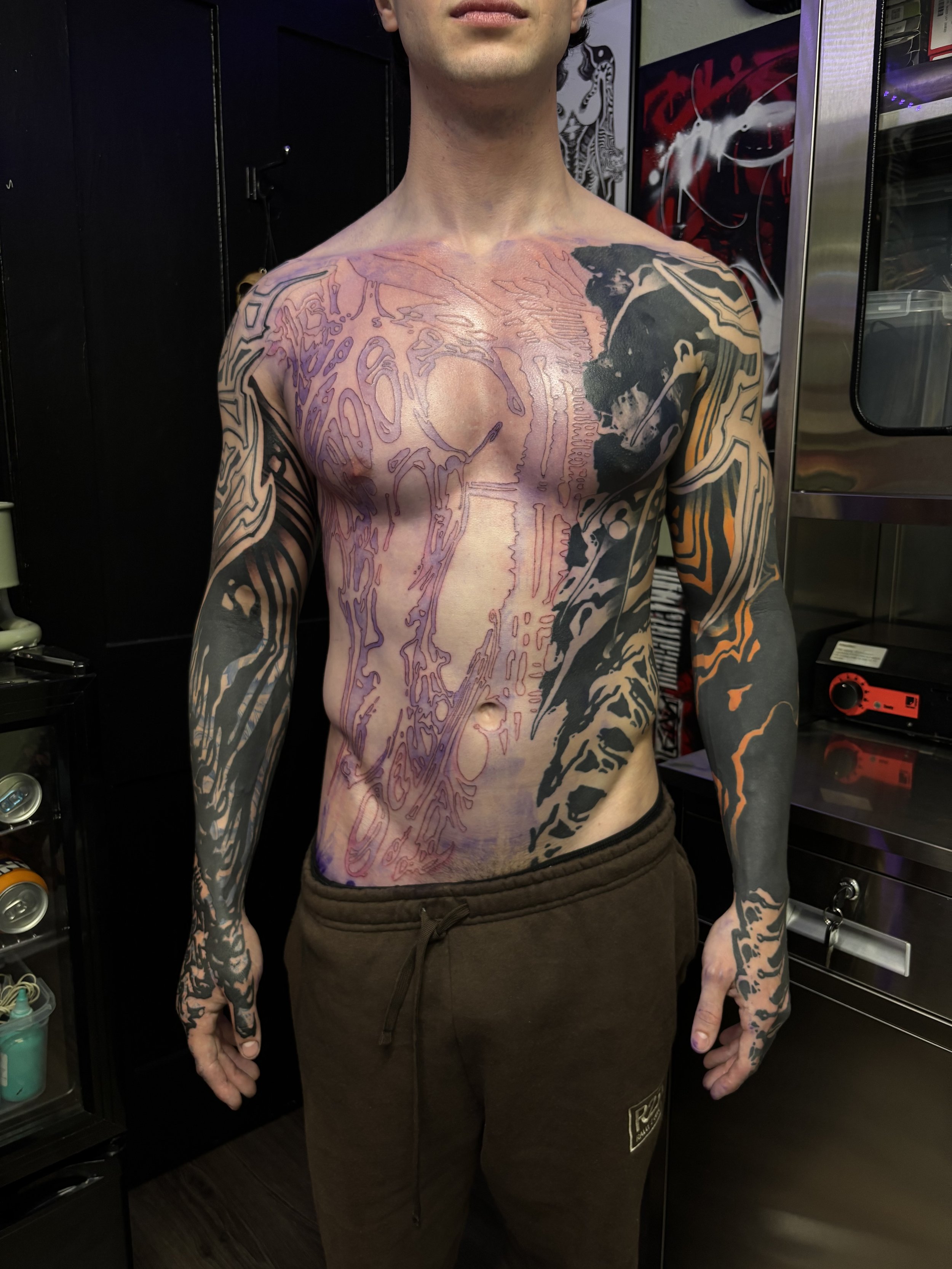 Abstract Blackwork full sleeves, hands and full front piece with distorted patterns and textures. Done by Görmex in London 