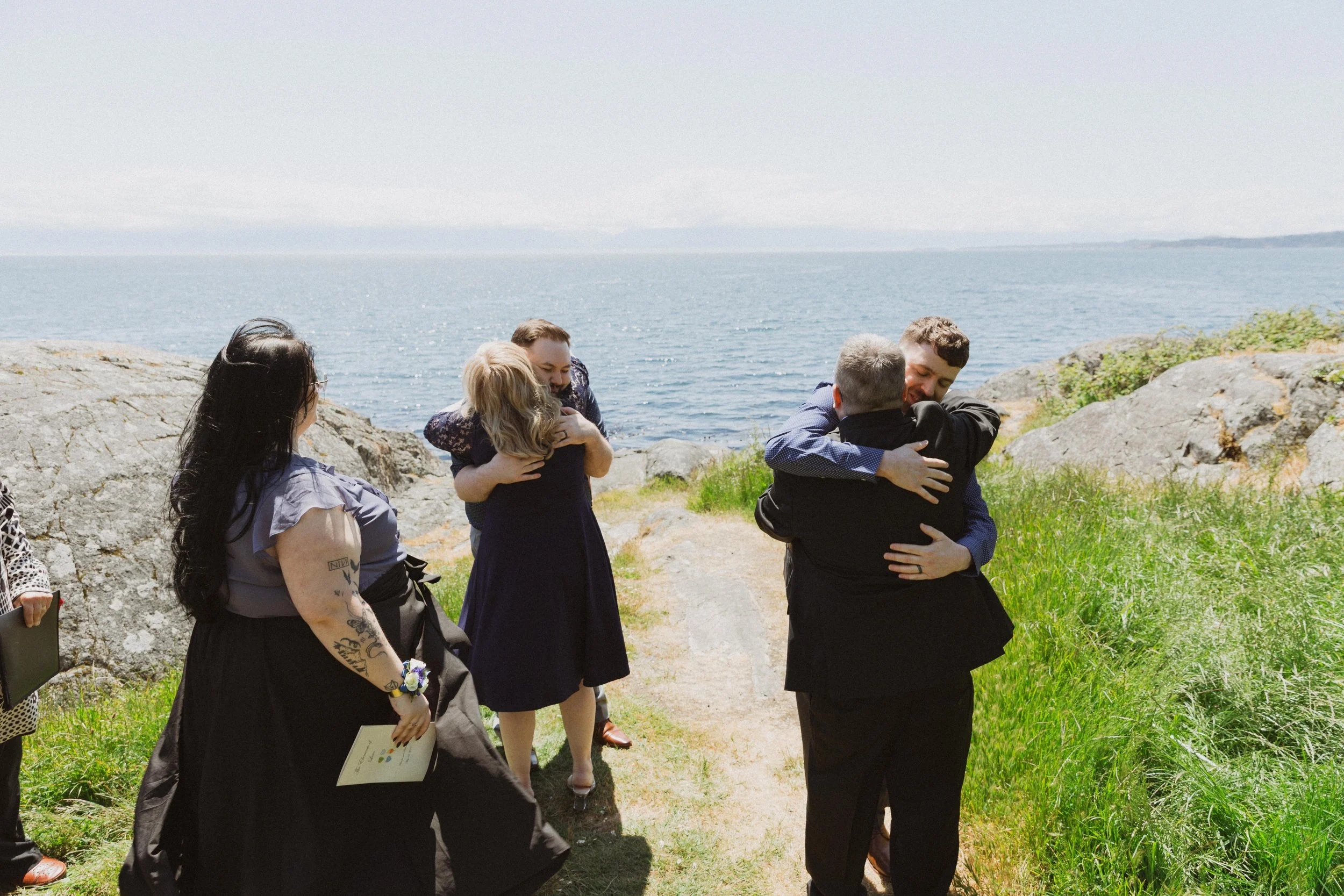 victoria-bc-elopement-family-hug-ocean.jpg
