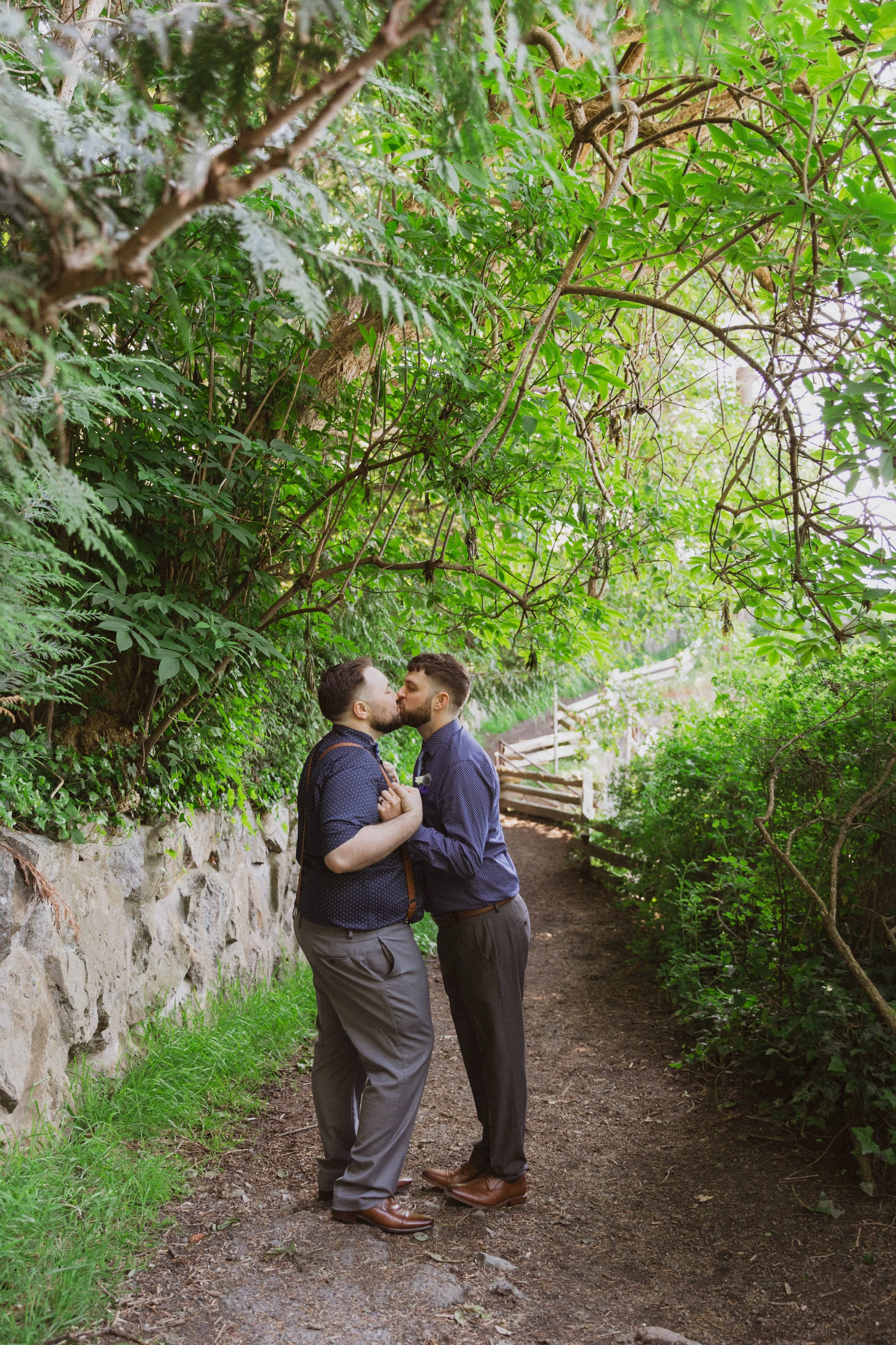 victoria-bc-forest-elopement-photography-two-grooms-kissing.jpg