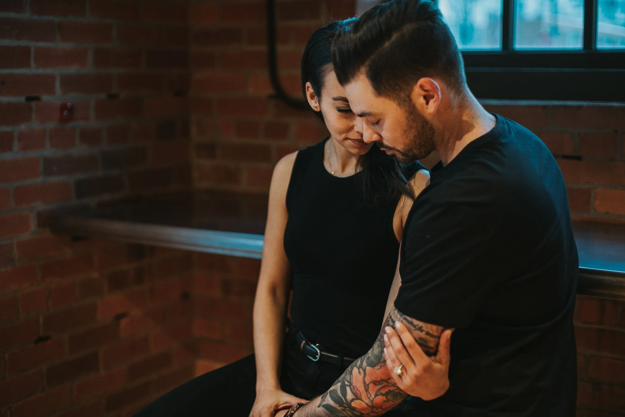 Engagement session at coffee shop in Calgary's East Village 