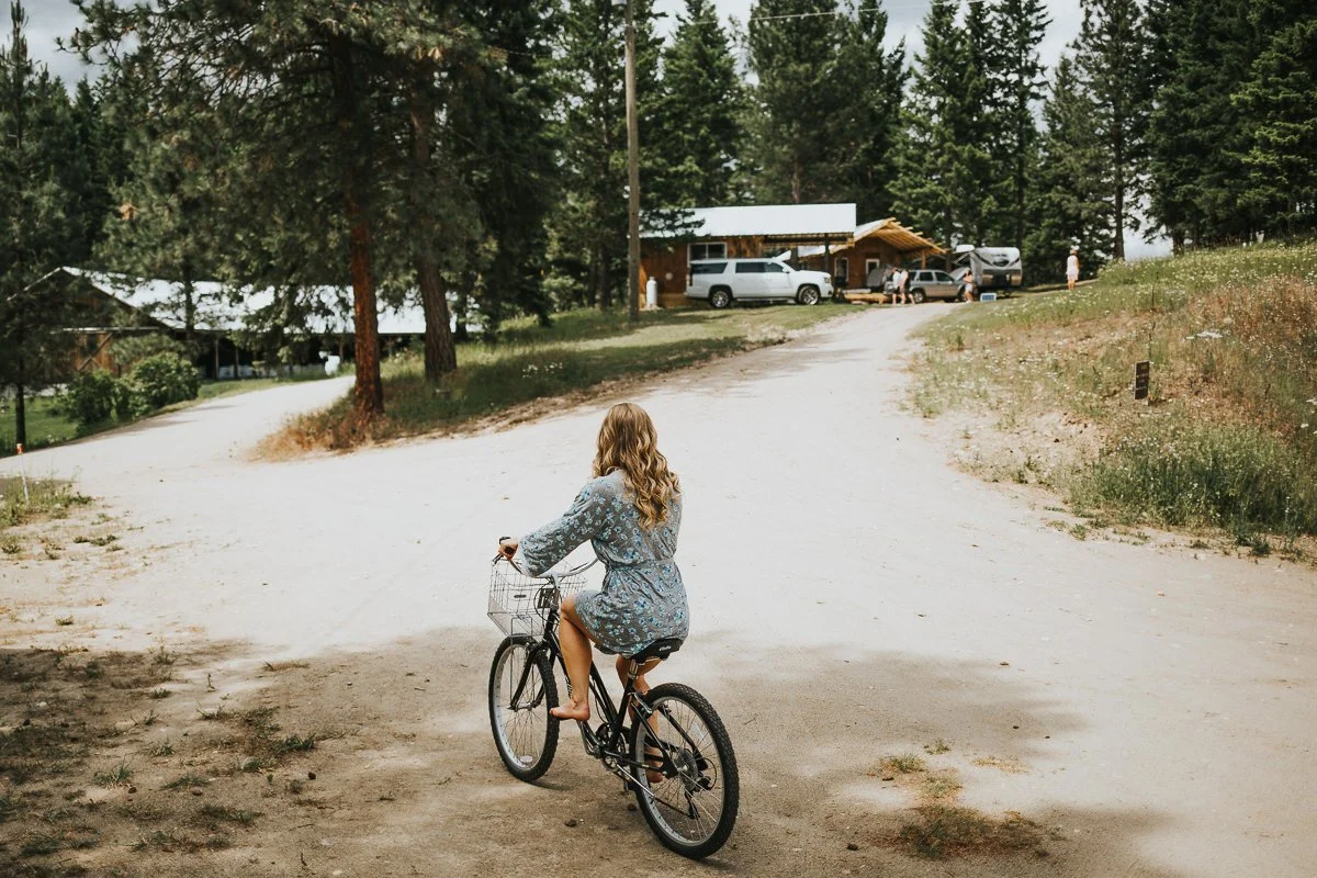 Bridesmaid flower robe riding bike before wedding 