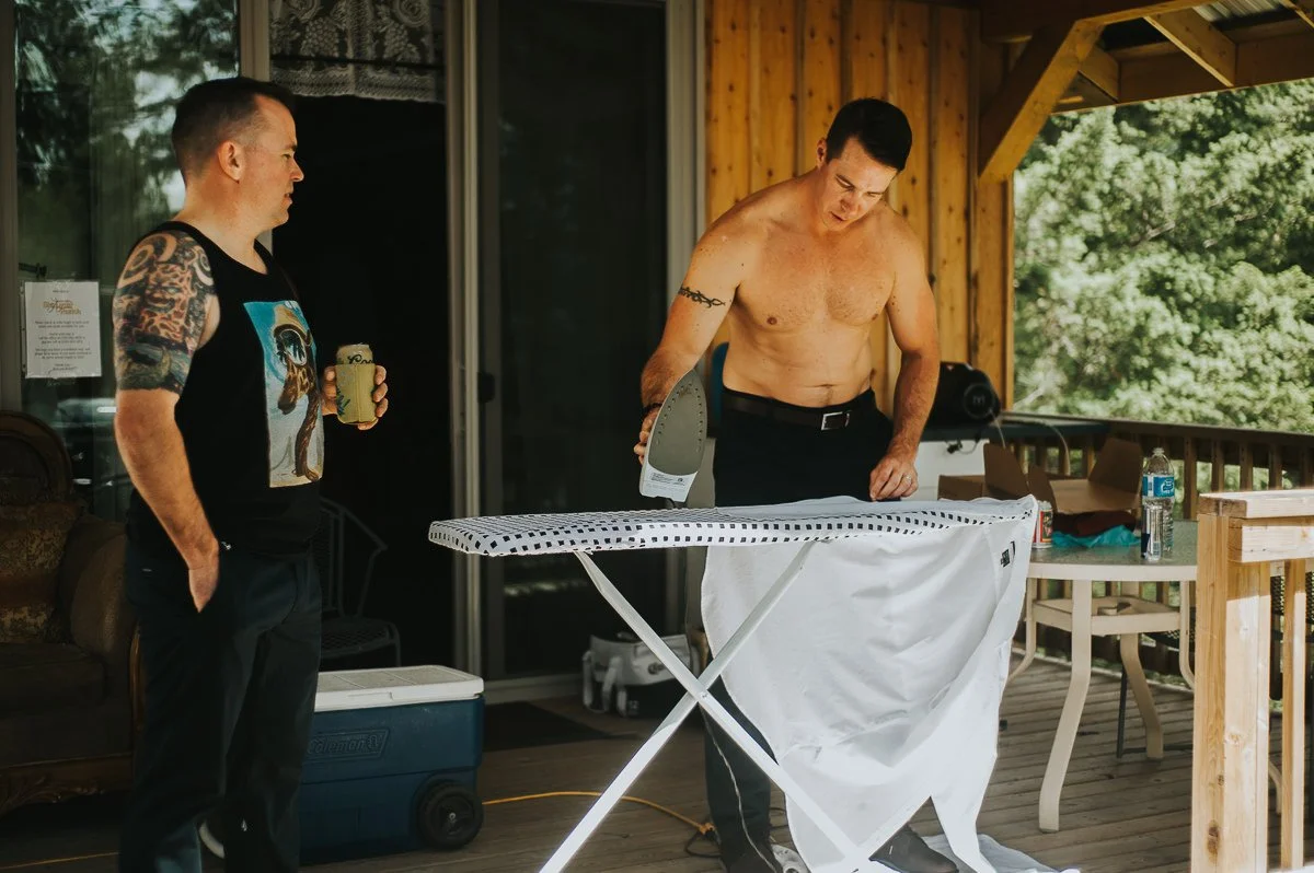 Groomsmen getting ready Alberta ranch wedding 