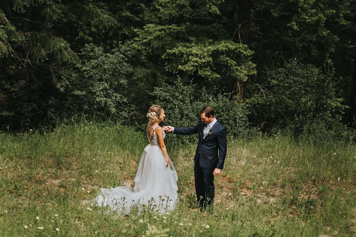 Bride and groom first look meadow ranch wedding