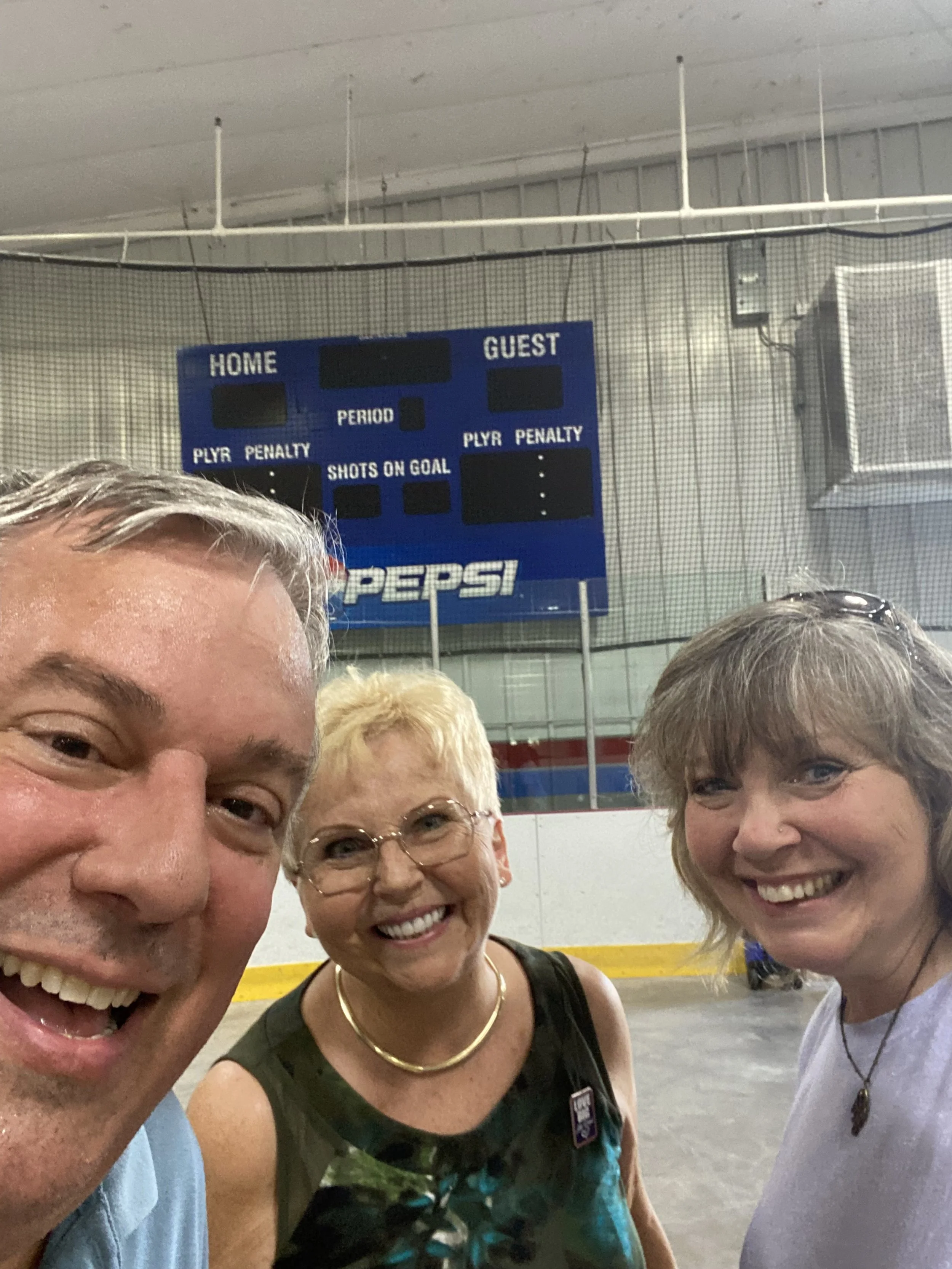 Pete with two.ice arena.jpg