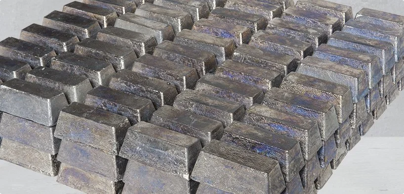 A large pile of black plastic LEGO bricks scattered randomly.