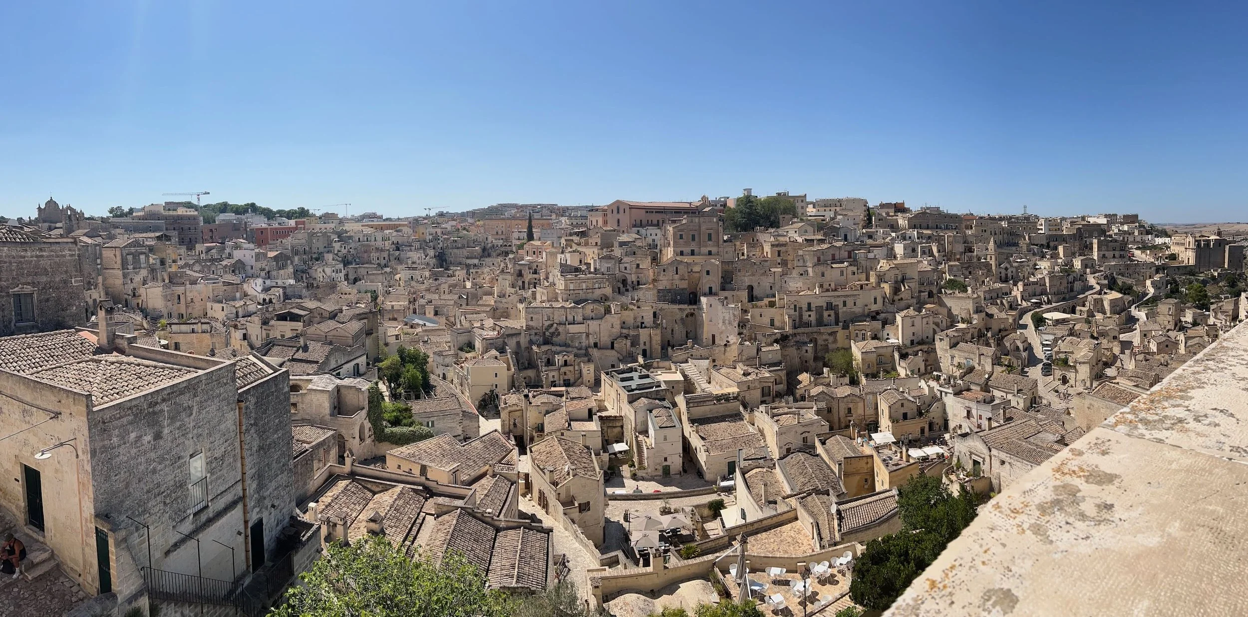 The city is carved into limestone cliffs above a rocky ravine and has gained recognition as a UNESCO World Heritage site for its unique blend of prehistoric caves, medieval architecture, and vibrant cultural life.