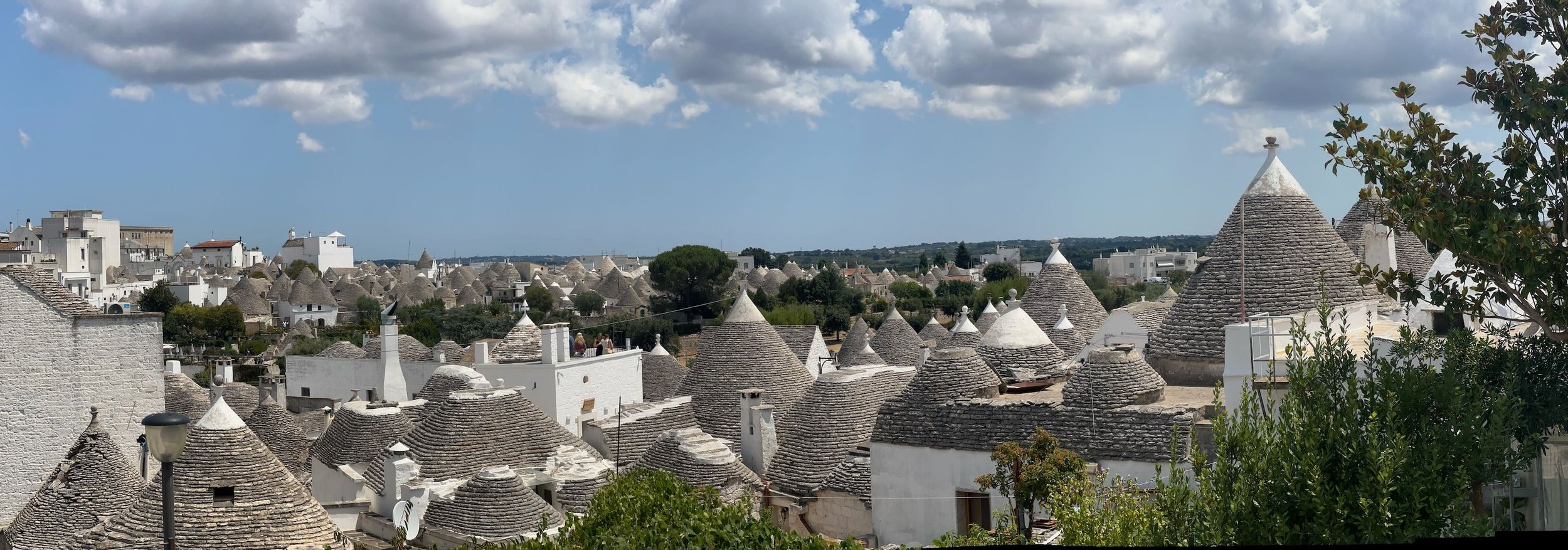 The most famous Trulli village, Alberobello, located in the Itria Valley of Puglia, southern Italy. Alberobello is renowned for its dense clusters of unique, conical-roofed limestone houses and is a UNESCO World Heritage Site. It has become very popu