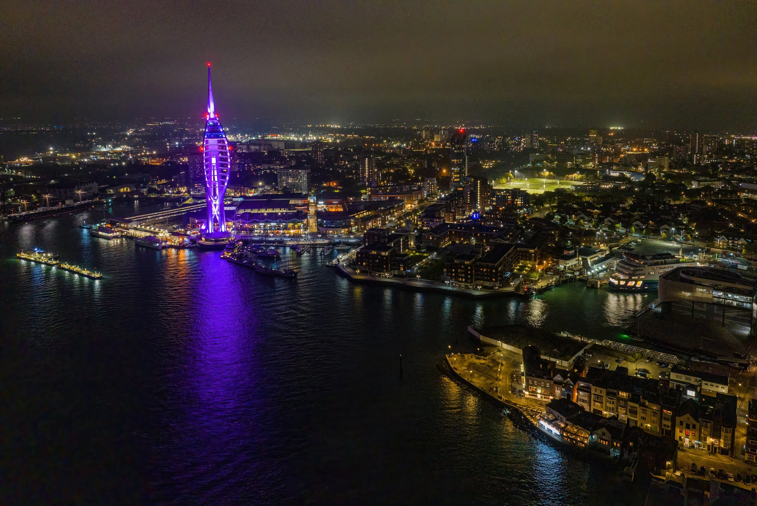 Portsmouth waterfront showing Spinnaker Tower and harbour facilities, an example of locations suited to marine construction and harbour time-lapse photography.