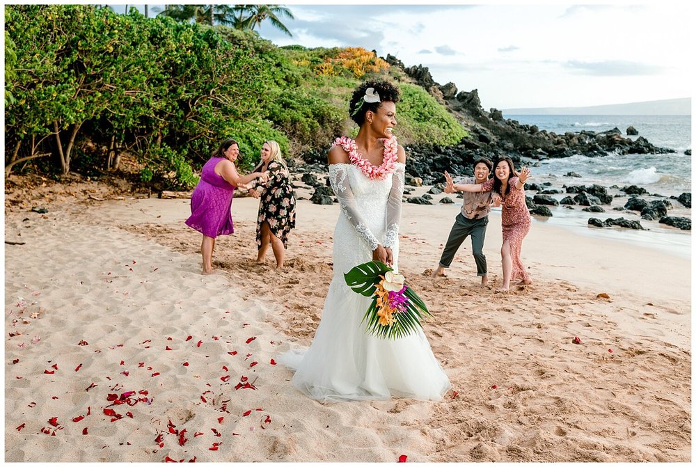 Bouquet toss during Maui wedding