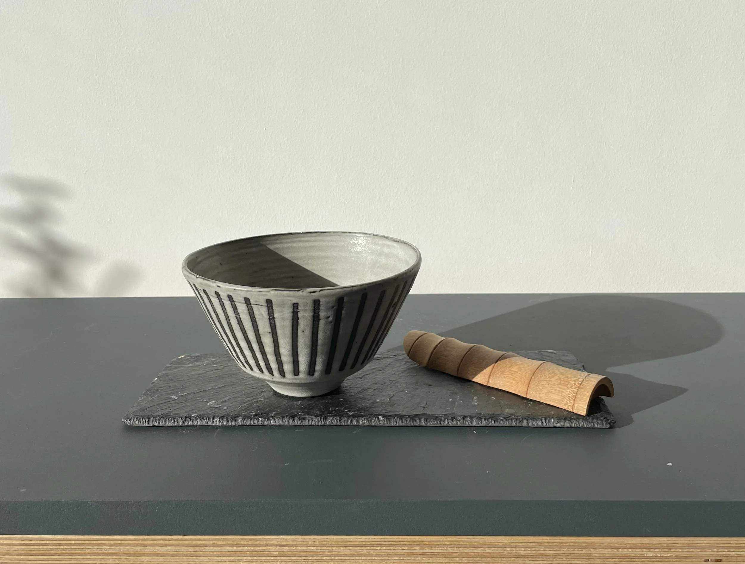 Seedpod small bowl w:bamboo server.jpeg