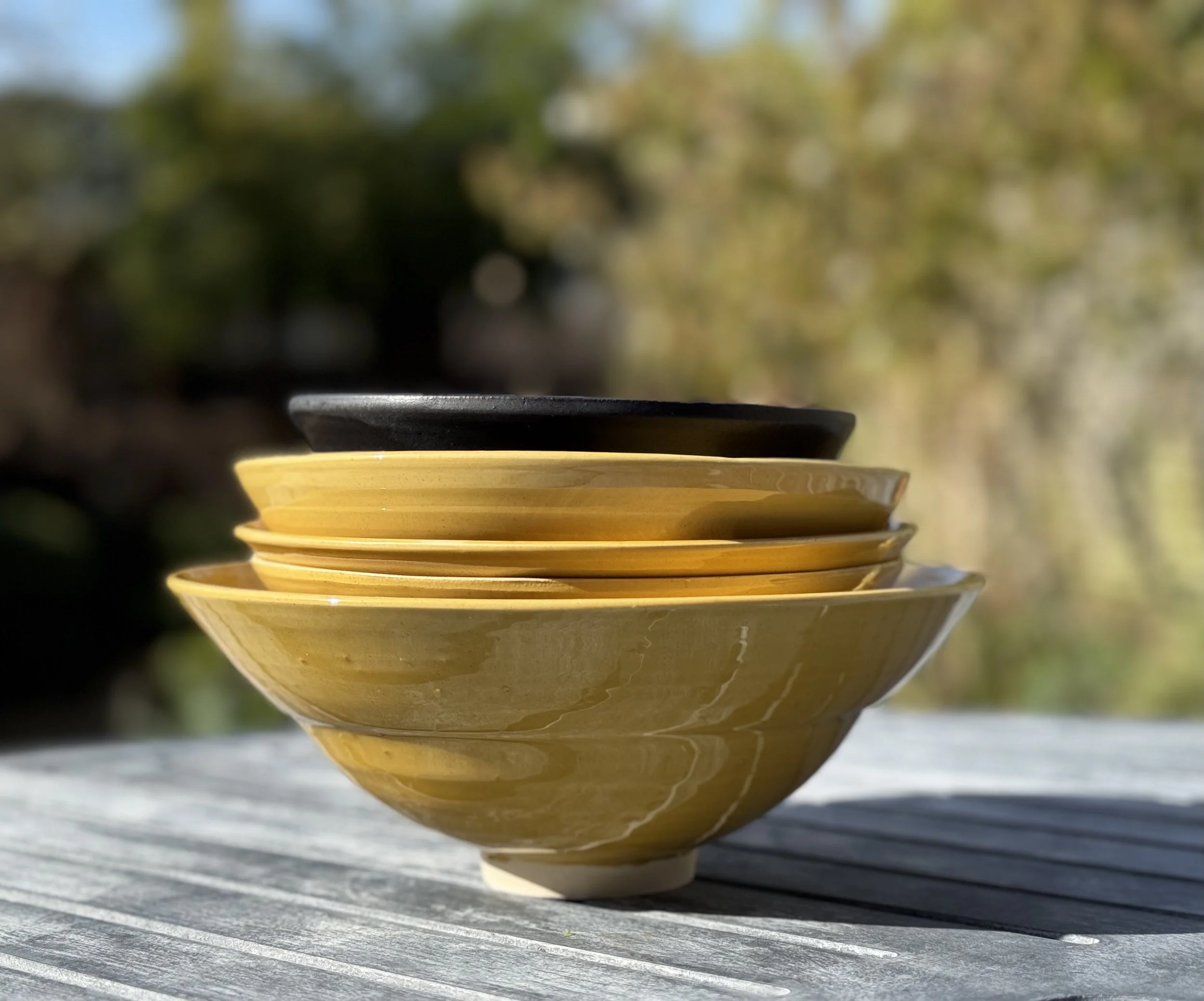 Clare Hughes_Ochre bowls profile stack.jpeg