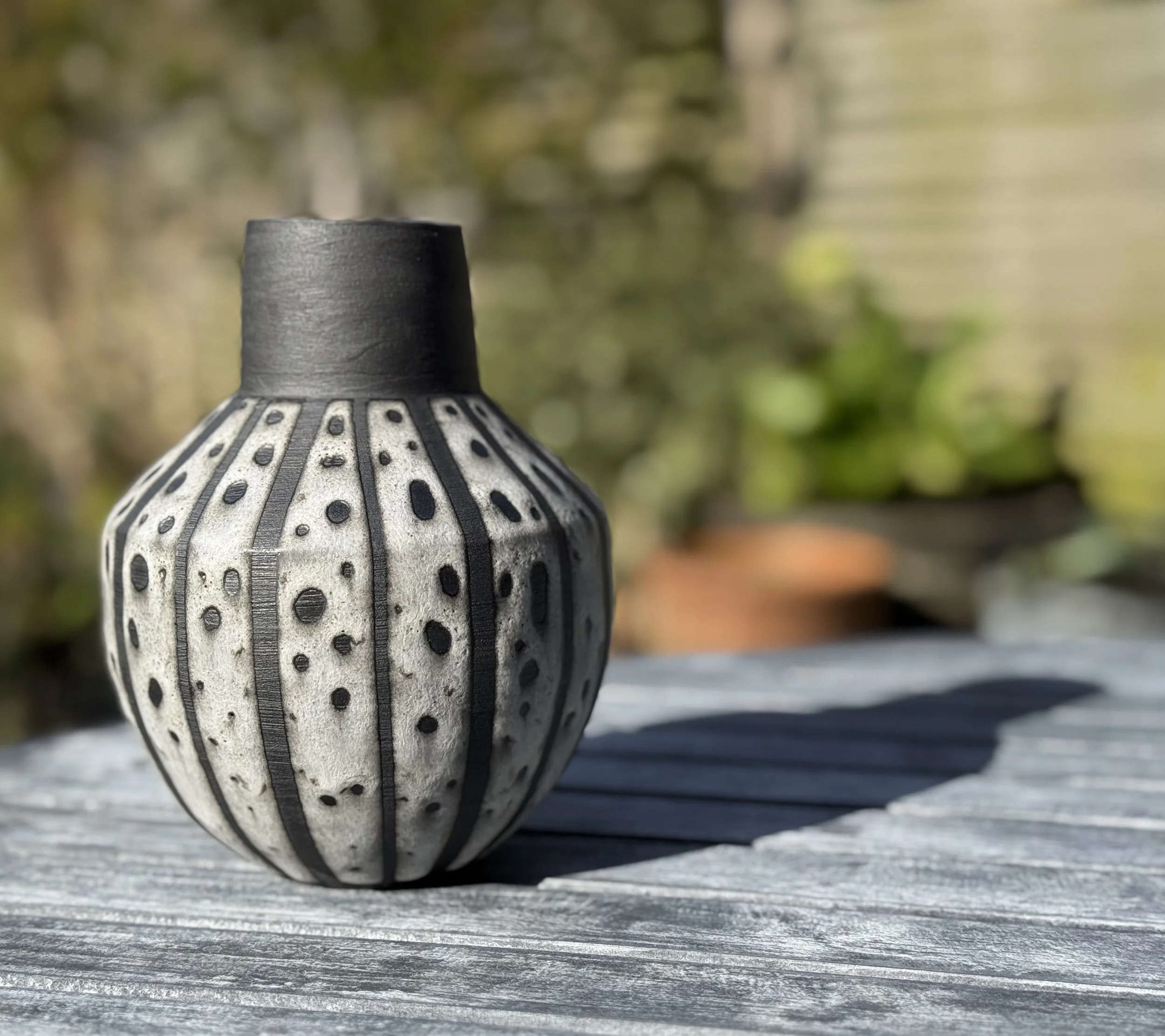 Clare Hughes_Seedpod angled shoulder vase.jpeg