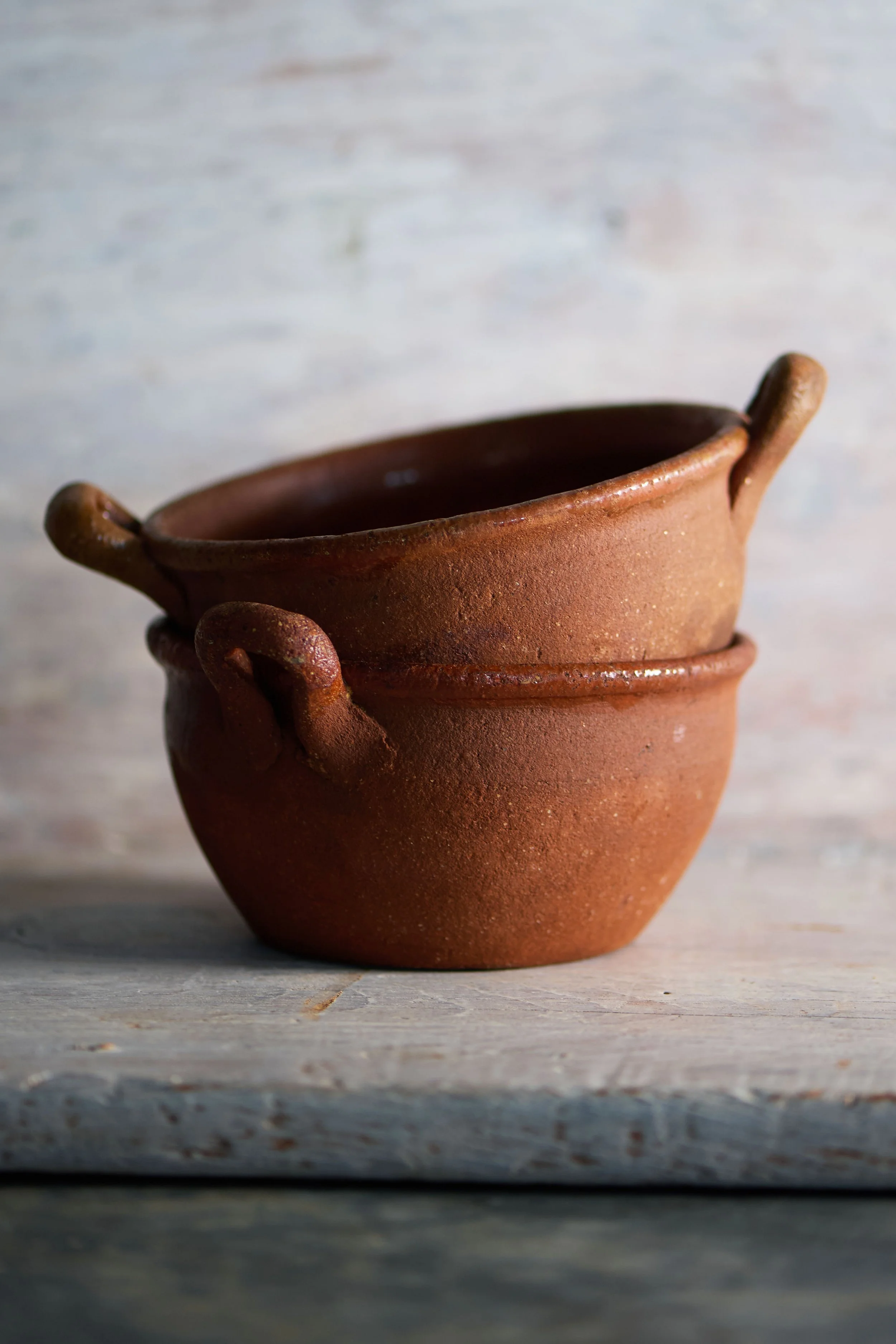 Terracotta bowls with handles