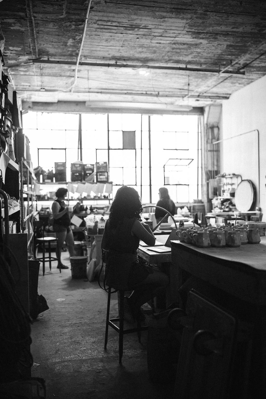  A black and white image of Lauren HB Studio interior space showing art available for purchase 