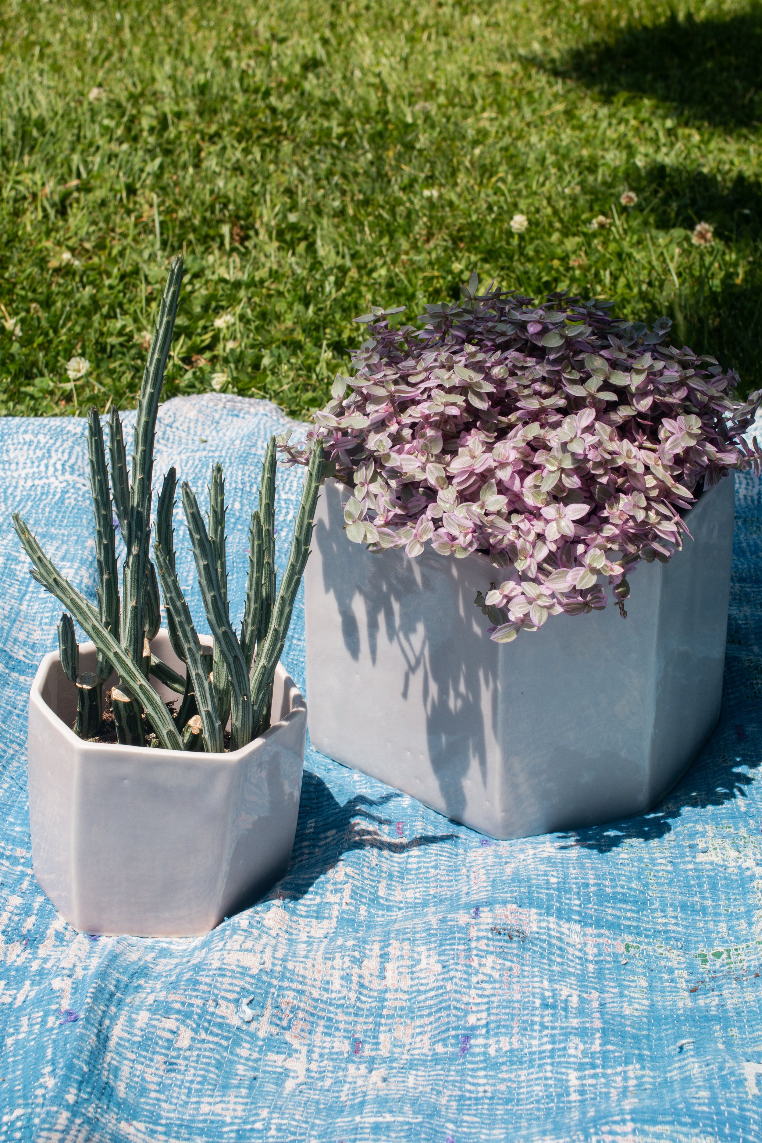  Two grey, geometric flower pots hand crafted by Lauren HB Studio available for purchase online 