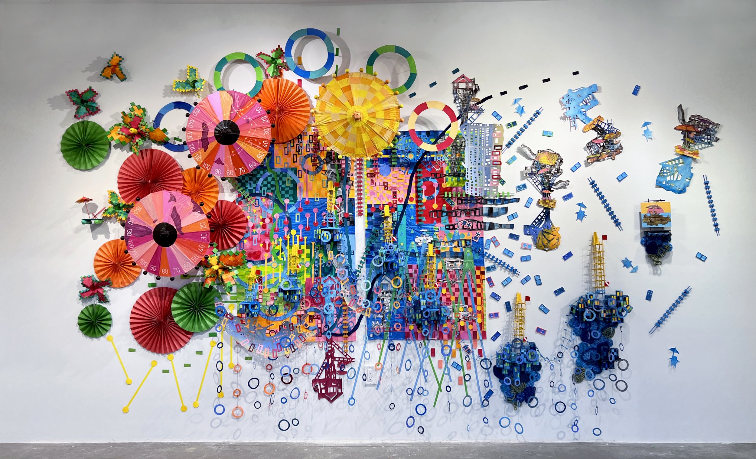 Ian and Nicole / 2023 / 12'x9'x1 / Paper, rope, data/ This piece is part musical score, part installation and speaks of the destruction and rebuilding of Daytona Beach after Hurricane Ian and Nicole passed through in Fall 2022. 