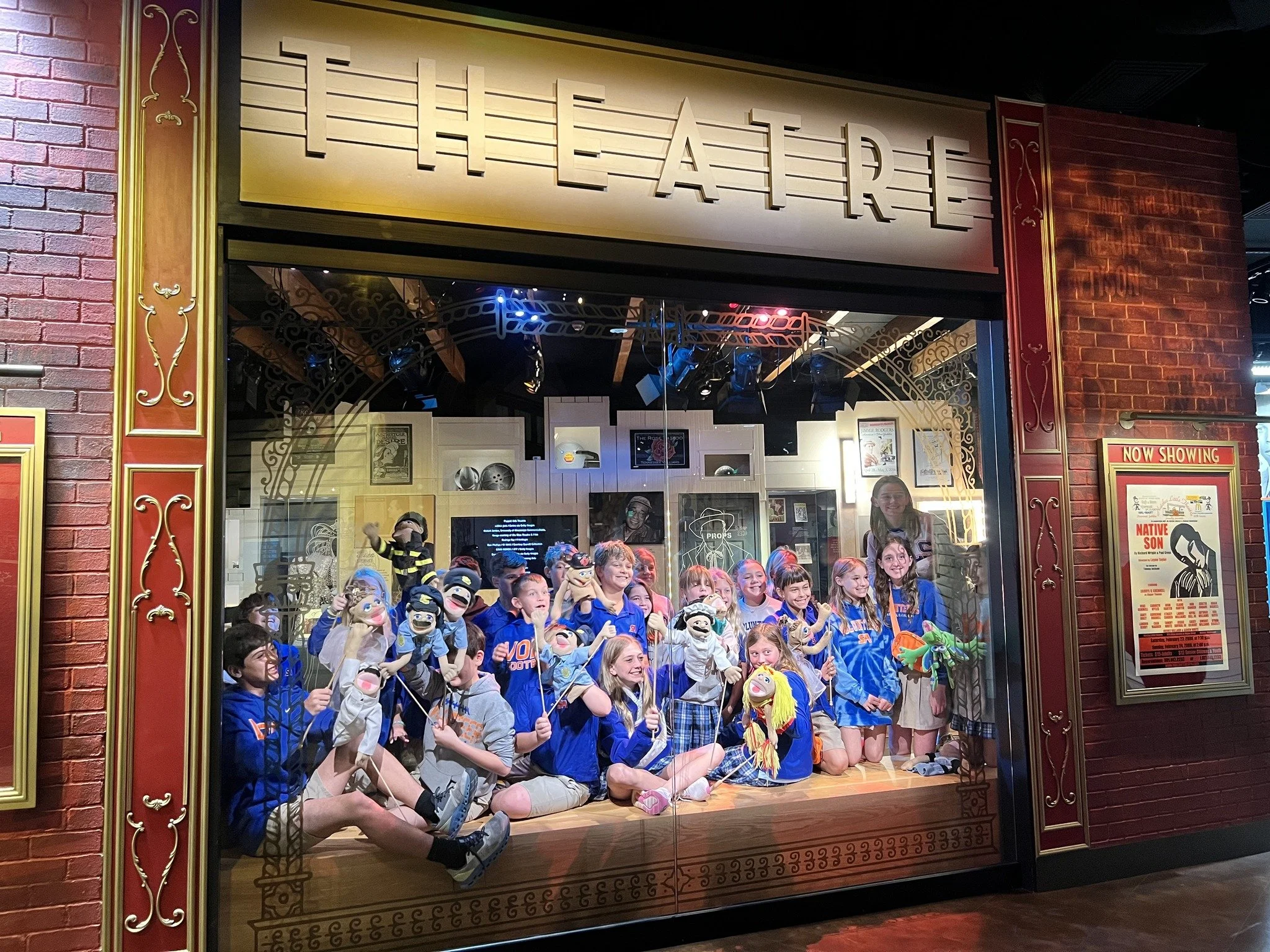 kids posing in the theatre