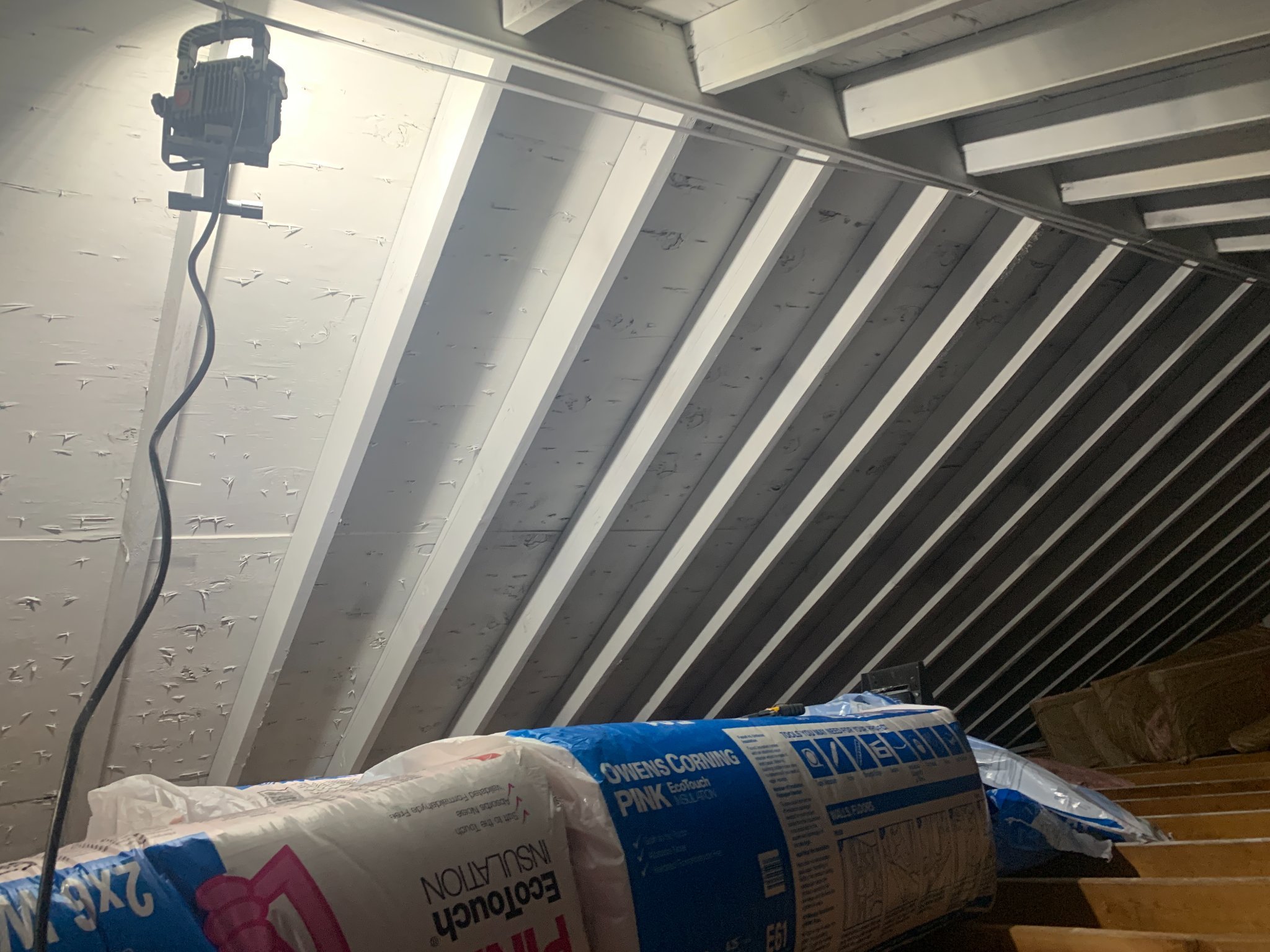 After mold remediation in attic with anti-microbial encapsulation