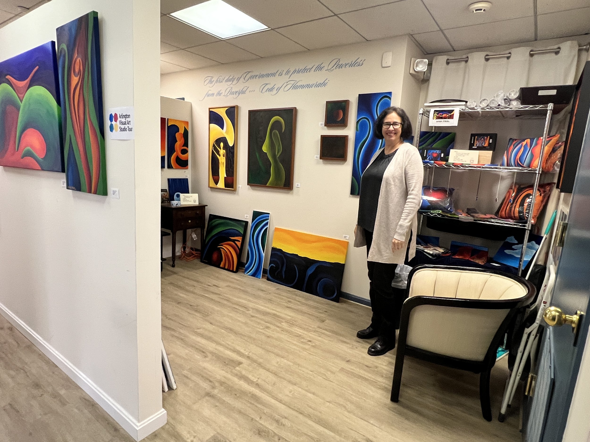 Dara Friel among her paintings