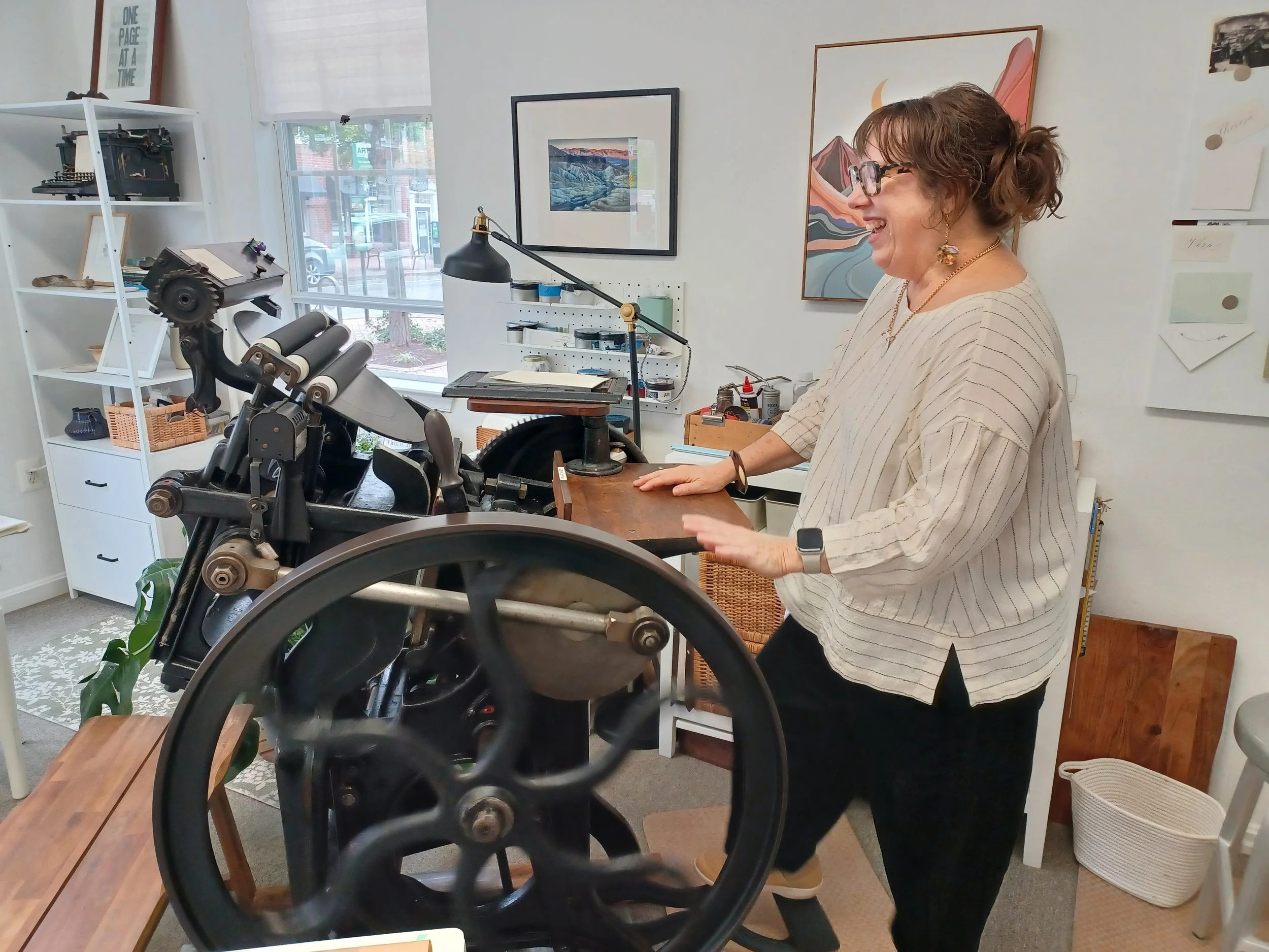 Theresa Esterlund demonstrating her historic letter press