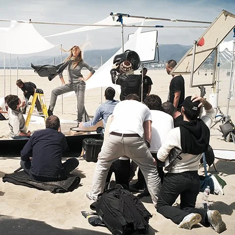 Gisele Bündchen on set for Stefanel, photographed by Sam Faulkner