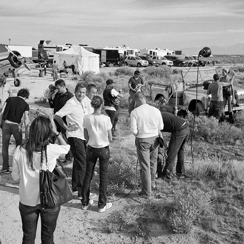 Mario Testino shooting a Michael Kors campaign in California, photographed behind the scenes by Sam Faulkner