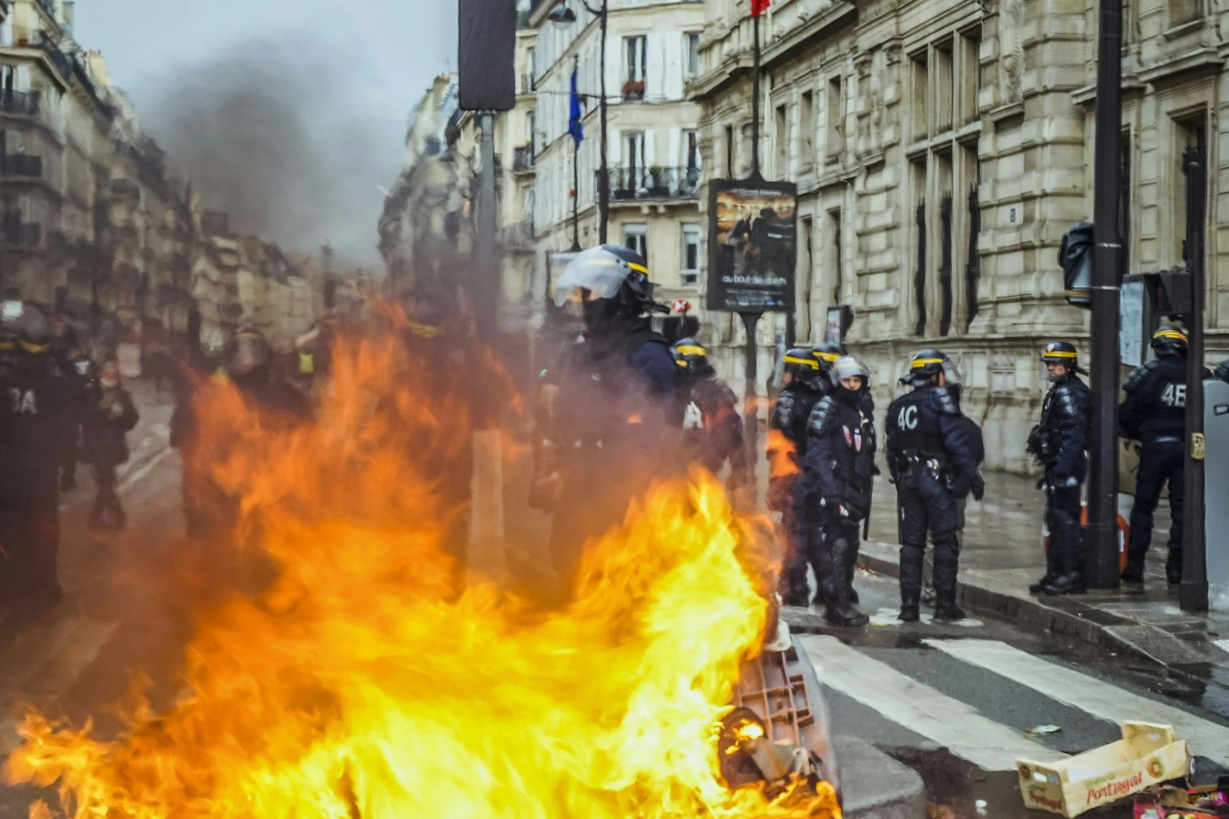 Why Is Paris Burning? Protestors Shout “We're Not Americans”