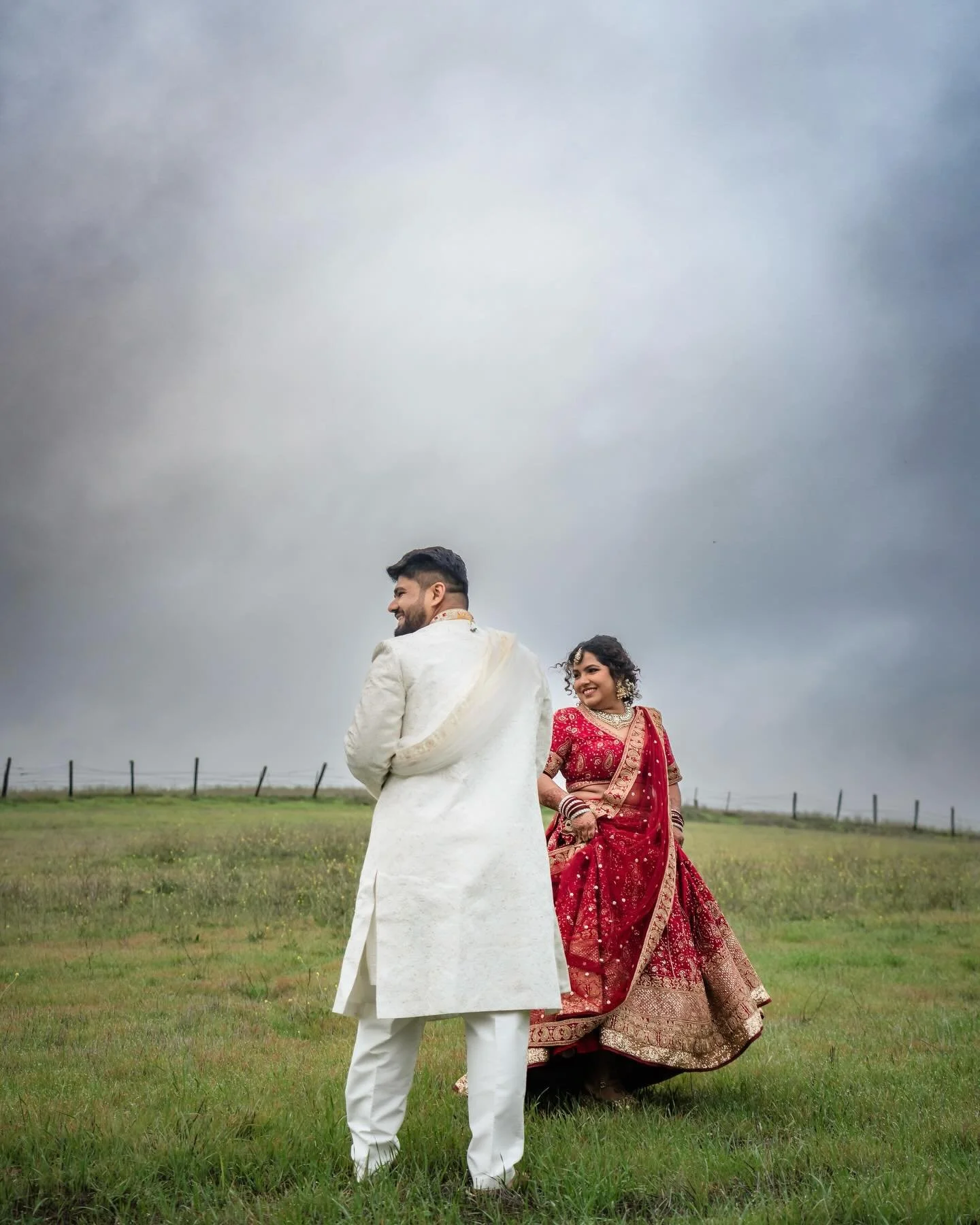 A sweet couple, a beautiful dramatic sky and everything beautiful. Pure magic💕
.
Images by @c_h_a_n_d_yo and me
Makeup and Hair: @shwetagurpur 
Henna: @henna_by_jinal 
Dress: @labelnehasinha 
Decor: @vijetha.events 
Video: @wedtokstudios 
.
.
.
.
Ba