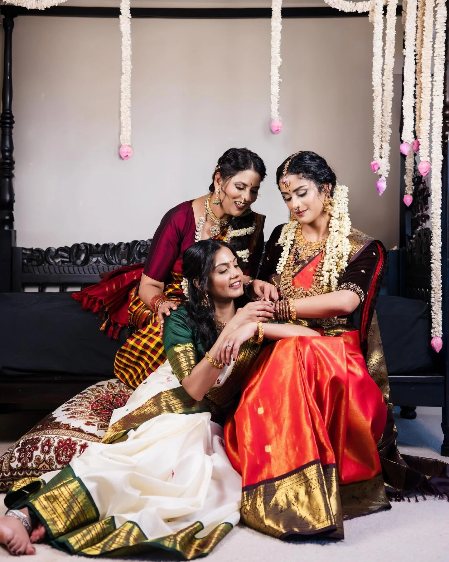 Wrapped in the alchemy of Kanjeevaram, where every thread is a story of legacy. Adorned in the sacred weight of temple gold and the fire of precious gems. She does not just walk; she reigns. With the scent of mogra trailing in her wake, she embodies 