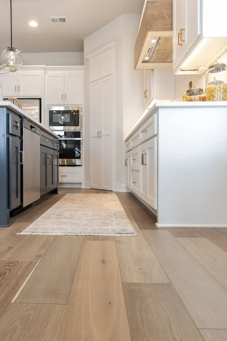 Warm Kitchen With Wood Flooring.jpg