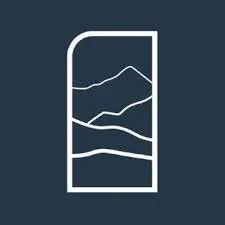 Outline of a door with a mountain landscape view inside.
