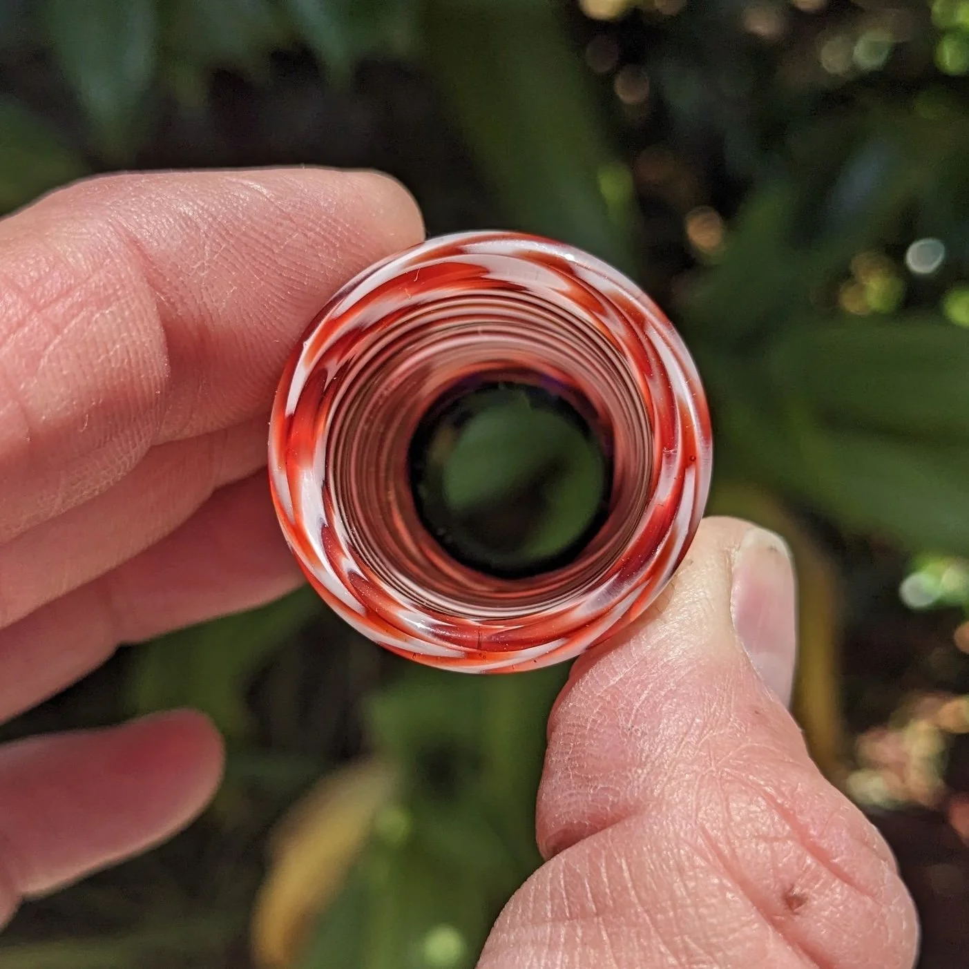 Striped end view of The Liberty Slide #2, red and white handmade glass guitar slide