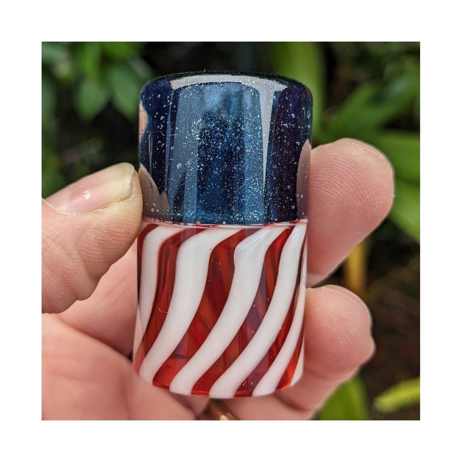 Close-up of The Liberty Slide #4, limited-run red white and blue Silica Sound glass guitar slide