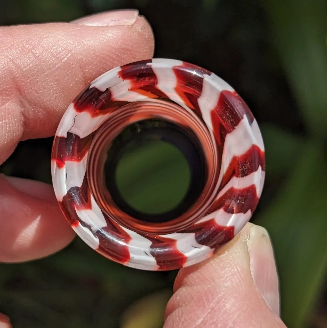 Striped end view of The Liberty Slide #3, red and white handmade glass guitar slide