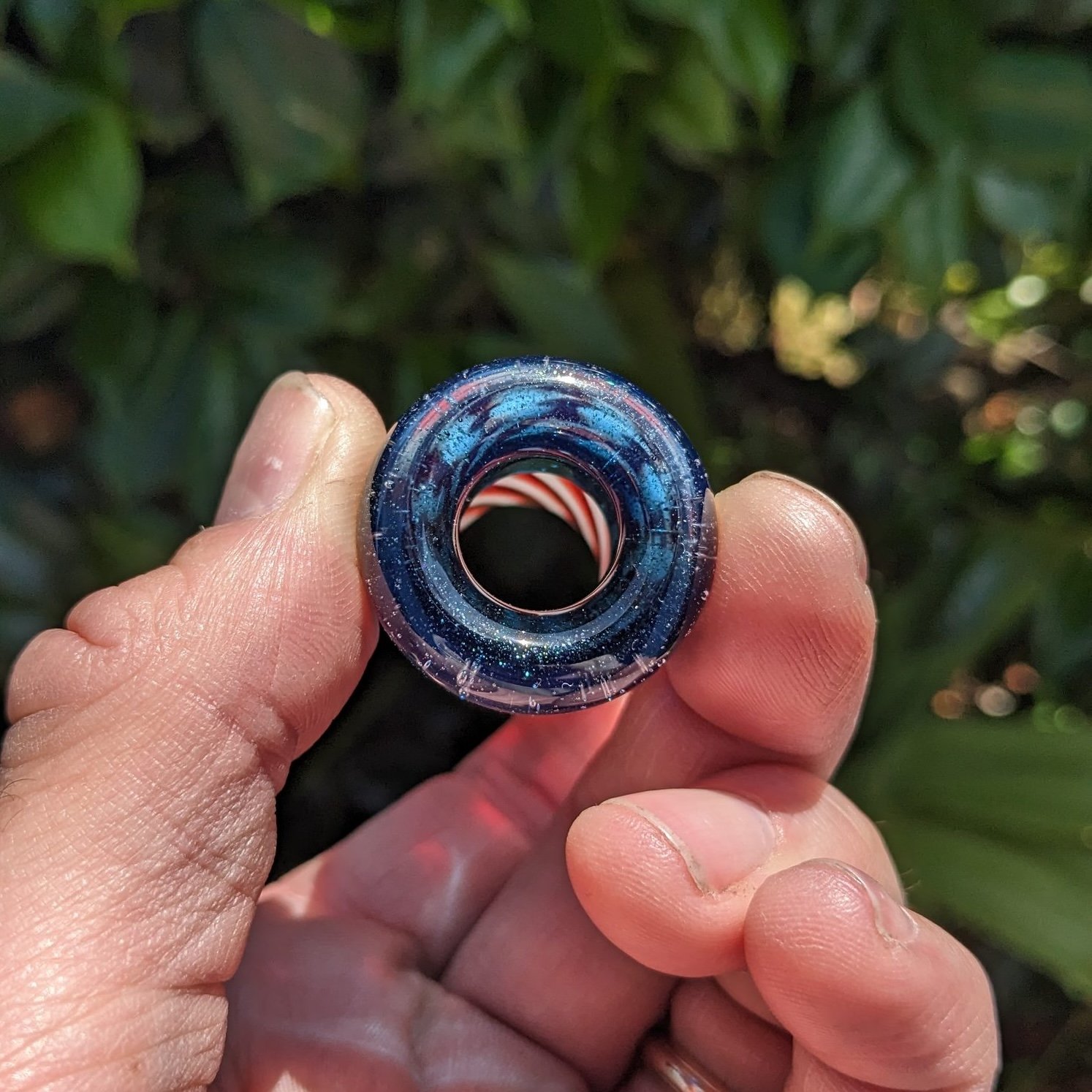 Blue tip end view of The Liberty Slide #1, handcrafted tapered glass guitar slide