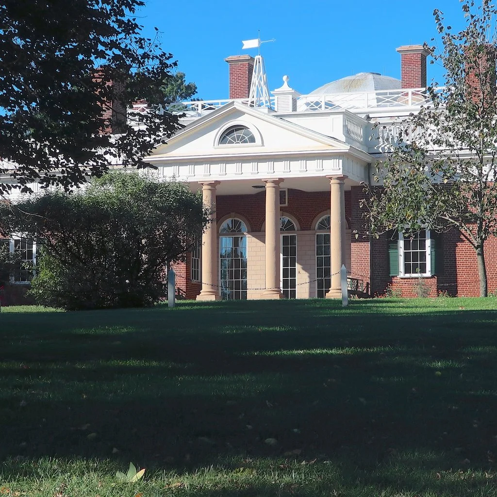 East Facade: The original main entrance is through the portico on the east front. The ceiling of this portico incorporates a wind plate connected to a weather vane, showing the direction of the wind.