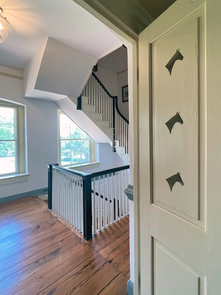 The landing shows the Woodward family's passion for horses with equestrian details to additions they made while expanding Belair.