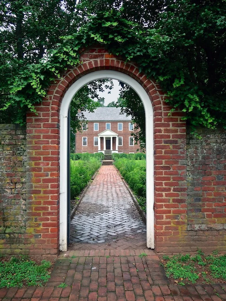 The symmetrical Georgian design of Kenmore is characterized by two five-bay brick facades, a half-hipped roof, end chimneys, and a modillion. Kenmore's exterior laid in Flemish bond is austere and pristine.