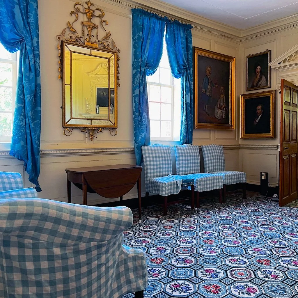 The Front Parlor: In the summer, slip covers were put on to help protect the very expensive silk and Saxon blue worsted wool upholstery. The furniture was acquired by Washington through a friend from neighboring Belvoir Plantation, George William and