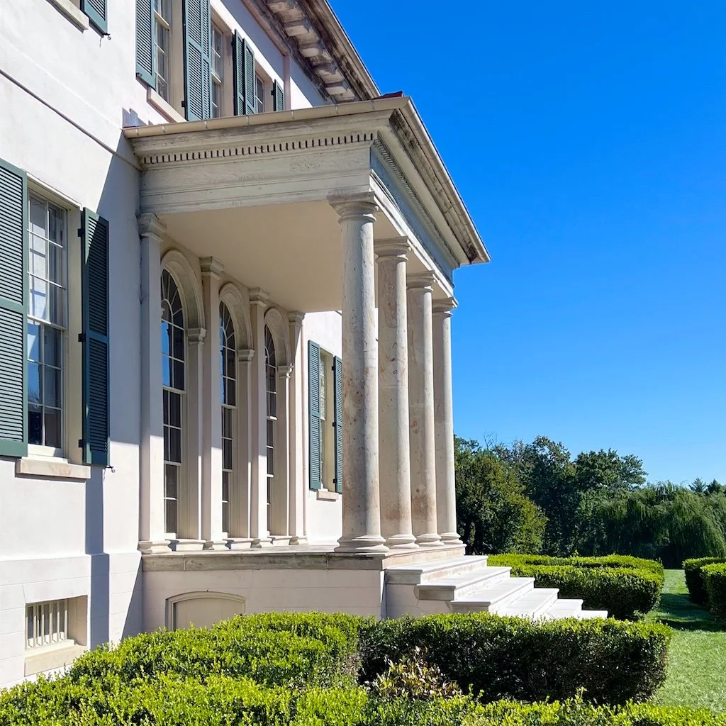 Riversdale North Elevation: Steir's Belgian home, Chateau du Mick, inspired the architecture of Riversdale, especially the East-West orientation of entertaining rooms, a style more popular in Europe than in America.